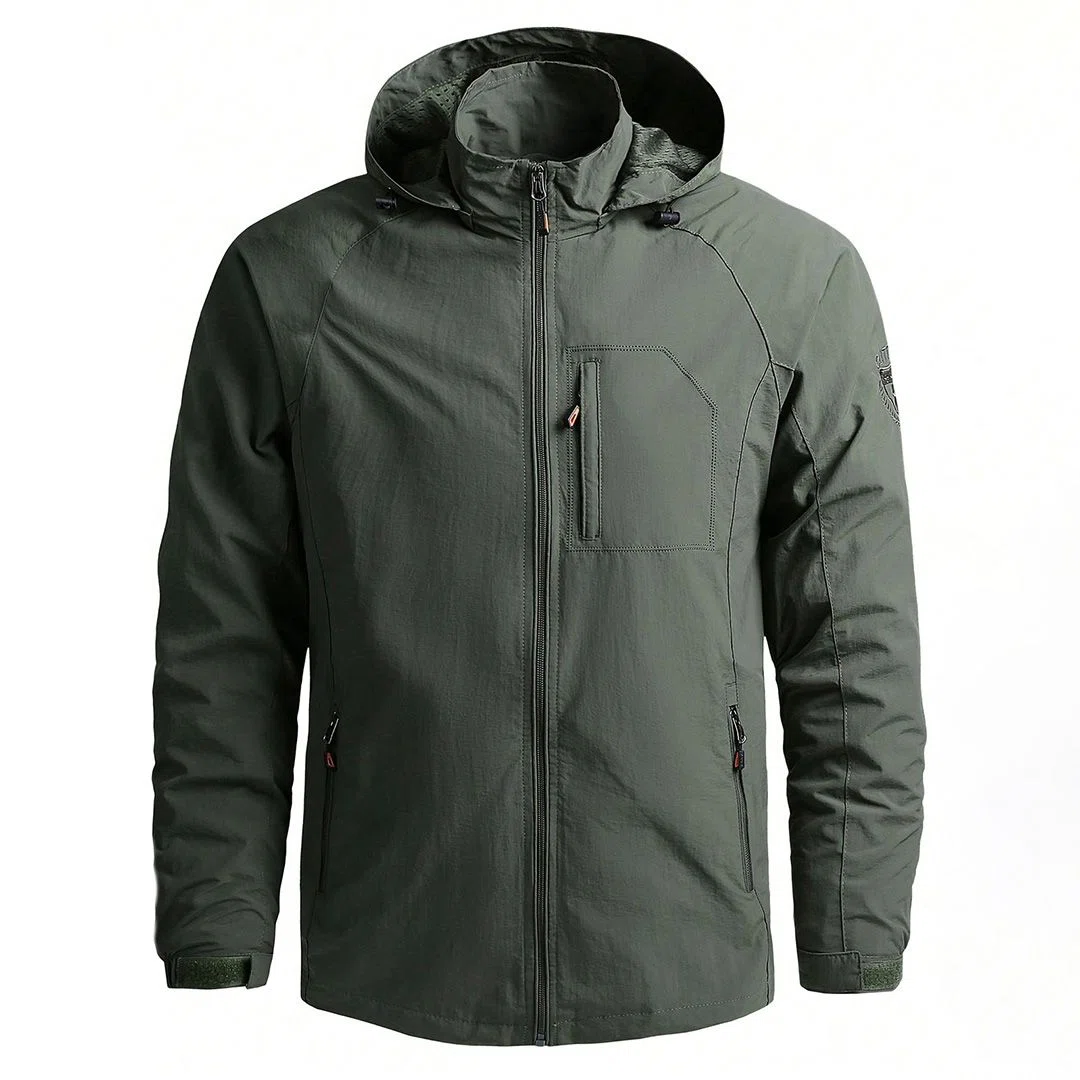 Custom embroidered logo on a patrol jacket sleeve highlighting branding detail