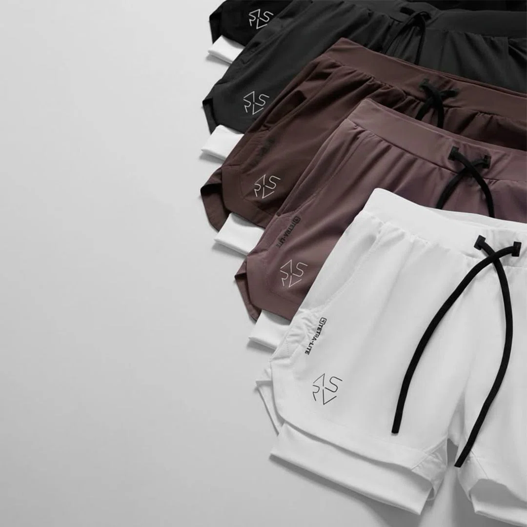 Variety of custom printed gym shorts showcasing different colors and personalized logo placements ideal for team branding.