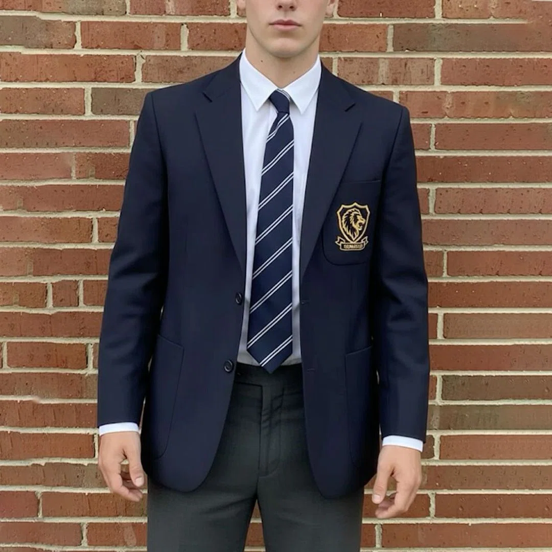 Custom logo embroidery detail on a blazer sleeve, showcasing quality stitching
