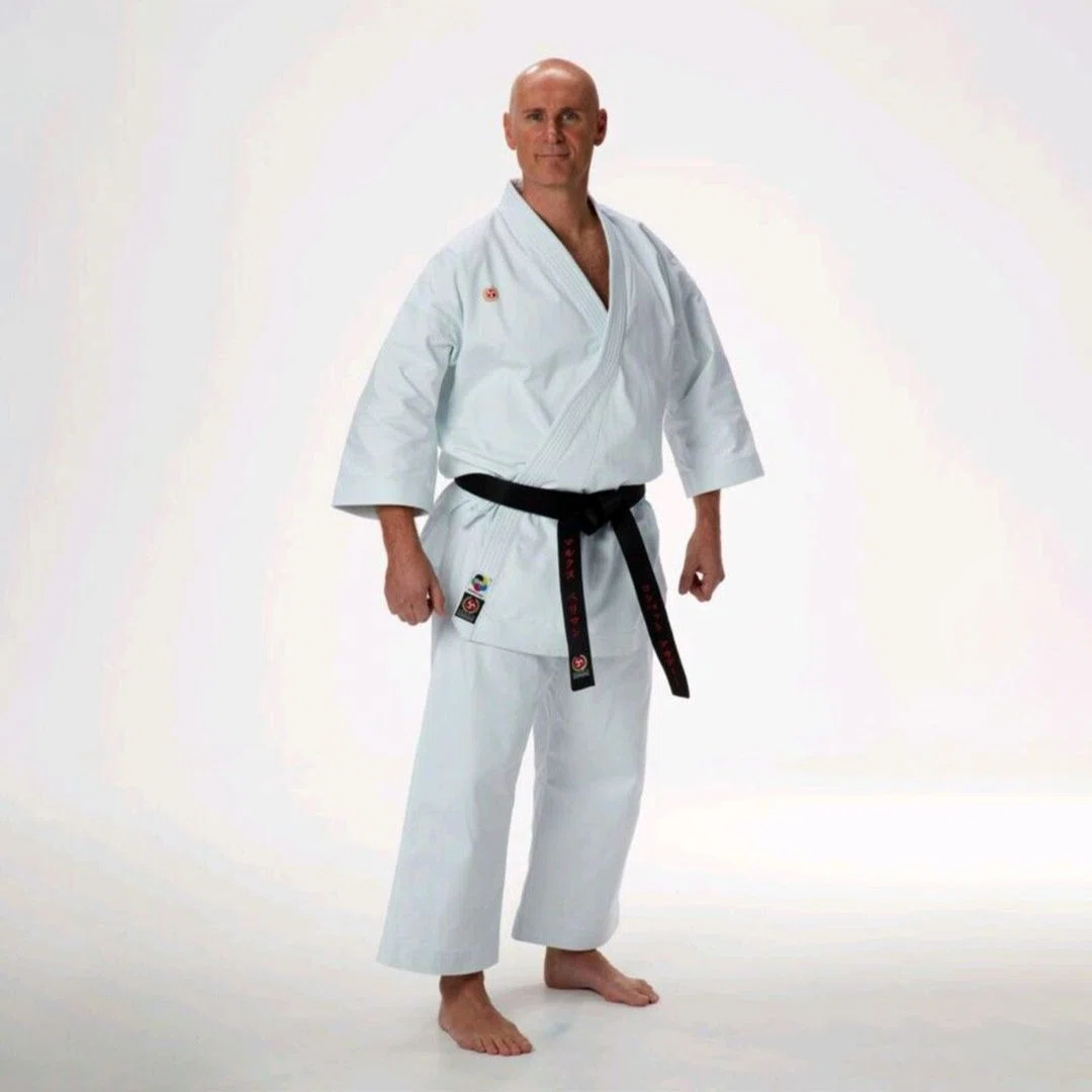 Close-up of custom jiu jitsu uniform fabric showcasing reinforced stitching and durable texture, designed for intense martial arts training.