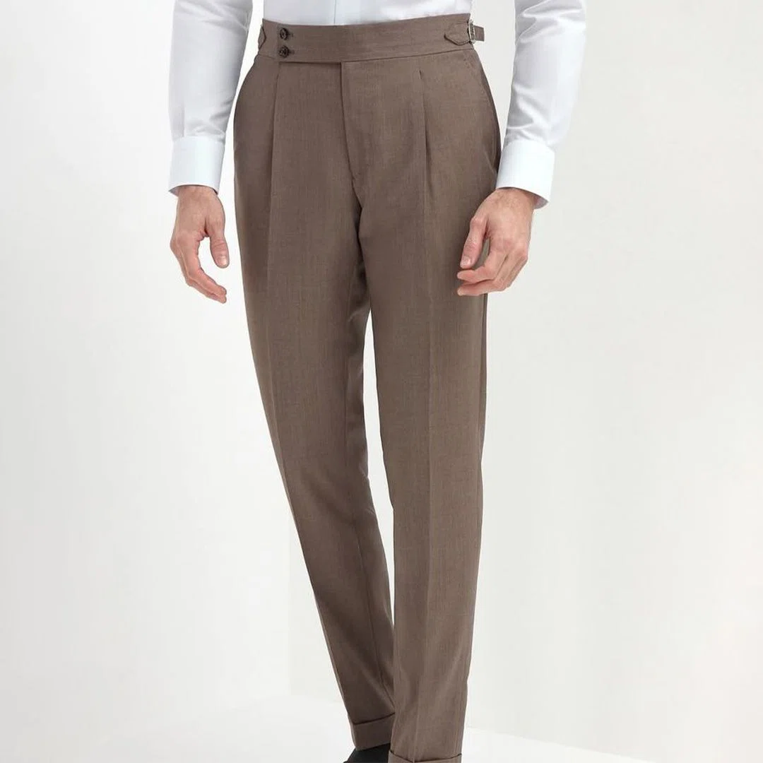 Close-up of premium custom dress pant fabric showcasing its durability and stylish finish suitable for corporate wear.